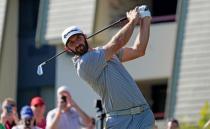 Mar 23, 2019; Palm Harbor, FL, USA; Dustin Johnson plays his shot from the 16th tee during the third round of the Valspar Championship golf tournament at Innisbrook Resort - Copperhead Course. Mandatory Credit: Jasen Vinlove-USA TODAY Sports