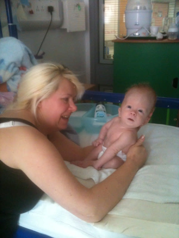 Mum Michelle with baby Noah. (SWNS)
