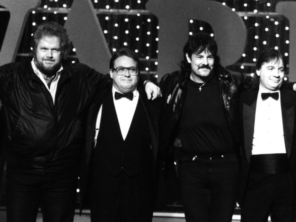 Left to right: Randy Bachman, Garry Peterson, Burton Cummings and Jim Kale appear on stage at the Juno Awards in Toronto on the night of Monday, Nov. 2, 1987, where their group, the Guess Who, was named to the Juno Hall of Fame. The reunited Guess Who will play at the closing ceremonies of the Pan American Games this weekend in Winnipeg.