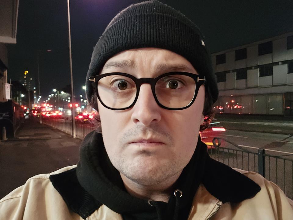 Selfie of a man taken at night