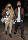 <p>Mariah Carey steps out with boyfriend Bryan Tanaka and one of her pups on Dec. 19 in Aspen. </p>