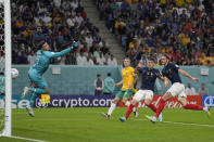 France's Adrien Rabiot, first right, scores with a header during the World Cup group D soccer match between France and Australia, at the Al Janoub Stadium in Al Wakrah, Qatar, Friday, Nov. 4, 2022. (AP Photo/Frank Augstein)