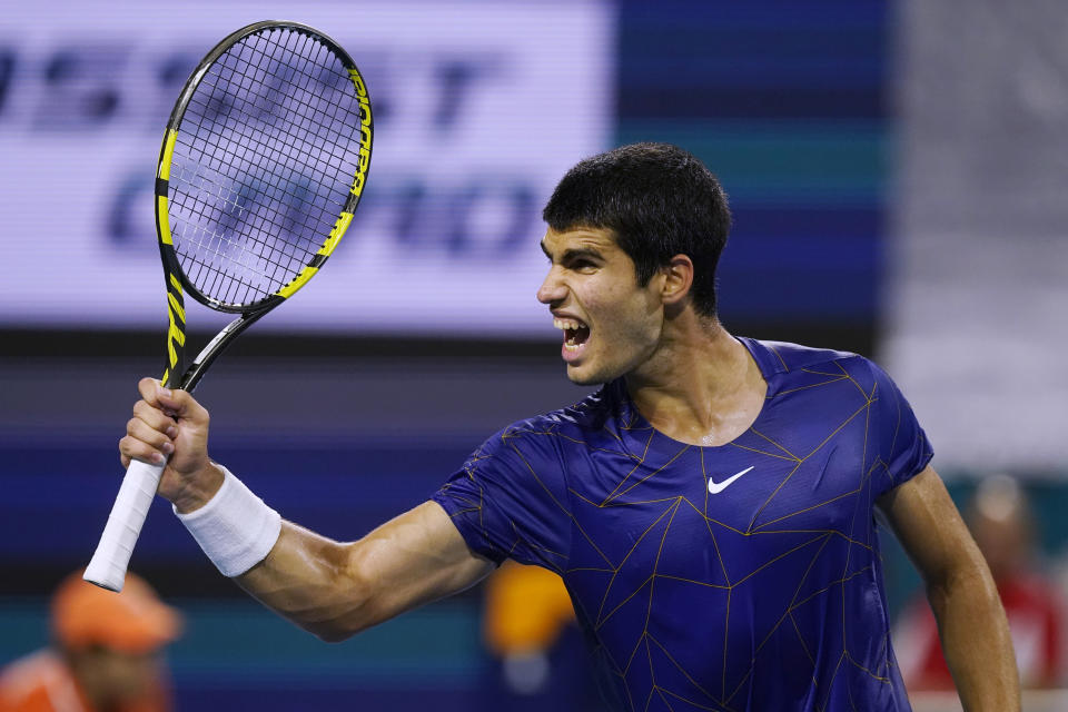 Carlos Alcaraz, of Spain reacts, to scoring a point in the first set against Hubert Hurkacz, of Poland, during the semifinals of the Miami Open tennis tournament Friday, April 1, 2022, in Miami Gardens, Fla. (AP Photo/Marta Lavandier)