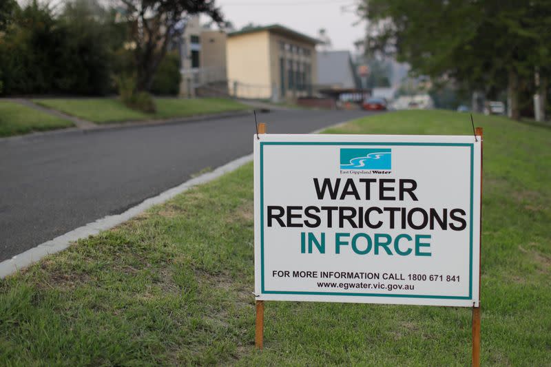 A sign for water restrictions in the area is seen in Buchan, Victoria, Australia