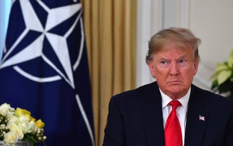 US President Donald Trump speaks during his meeting with Nato Secretary General Jens Stoltenberg at Winfield House, London - Credit: Nicholas Kamm/AFP