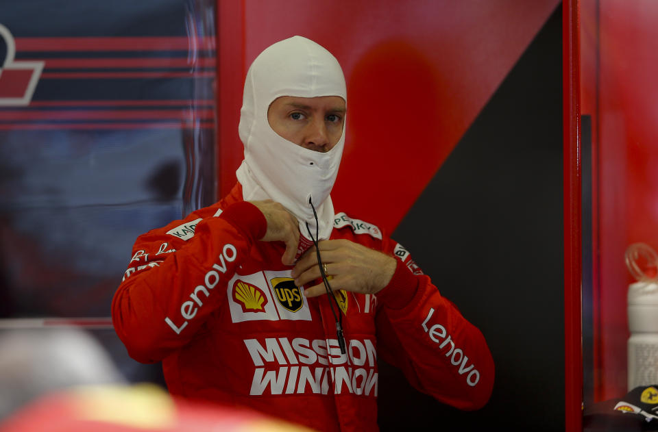 Ferrari driver Sebastian Vettel, of Germany, prepare at the pit lane during the first training session of the Formula One Mexico Grand Prix auto race at the Hermanos Rodriguez racetrack in Mexico City, Friday, Oct. 25, 2019. (AP Photo/Eduardo Verdugo)
