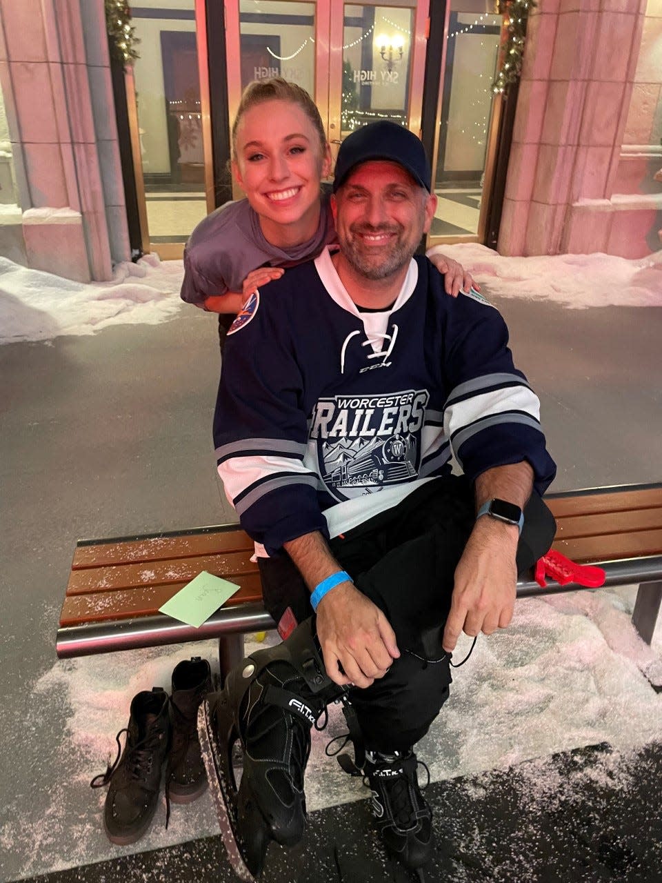 “Spirited” director/co-scriptwriter Sean Anders wearing his prized Worcester Railers hockey jersey that he bought when he filmed scenes for the movie in Worcester. With Anders is the film’s ice skating coordinator, Madeleine Gallagher.