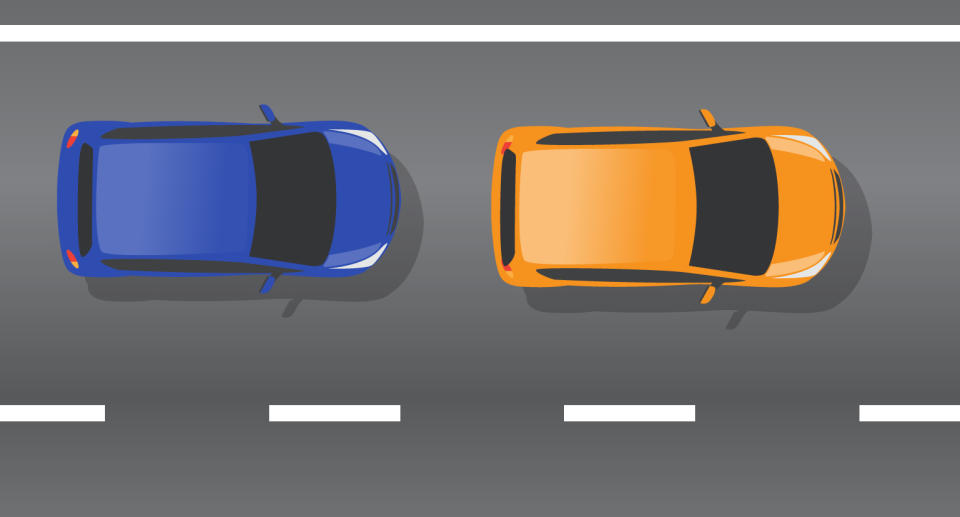 A blue car is pictured behind an orange car.