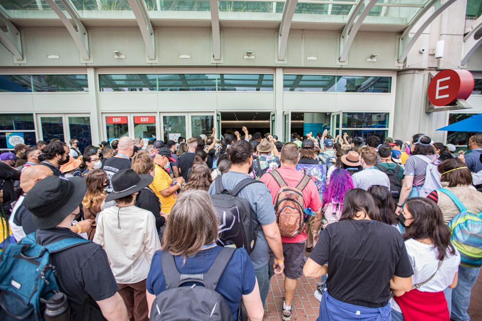 SAN DIEGO, CALIFORNIA - JULY 22: Fans line up to enter 2022 Comic-Con International Day 2 at San Diego Convention Center on July 22, 2022 in San Diego, California.