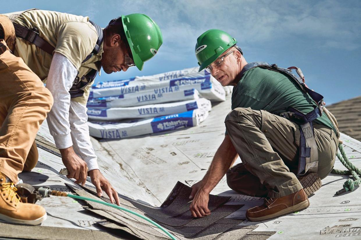 Roofers install Malarkey asphalt shingles. PROVIDED/MALARKEY ROOFING PRODUCTS