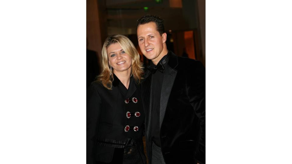 Corinna Schumacher smiling with Michael Schumacher