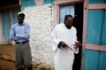 Catechist director Jean Pierre Biennelus walks towards a Catholic church in Boucan Ferdinand, Haiti, October 7, 2018. REUTERS/Andres Martinez Casares