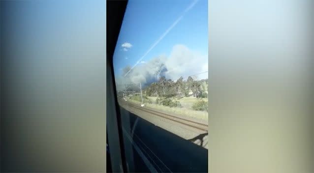 Passengers could see smoke billowing from the towns ahead. Source: YouTube/ Rohit Mahajan