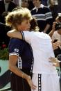 Martina Hingis of Switzerland is consoled by her mother after being defeated during the 1999 French Open Final match against Steffi Graf of Germany played at Roland Garros in Paris, France. The match finished with Steffi Graf of Germany clinching the title after a dramatic comeback 4-6, 7-5, 6-2. \ Mandatory Credit: Stu Forster /Allsport