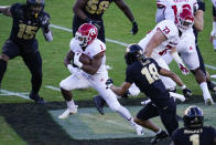 Rutgers running back Isaih Pacheco (1) runs past Purdue cornerback Cam Allen (18) during the first quarter of an NCAA college football game in West Lafayette, Ind., Saturday, Nov. 28, 2020. (AP Photo/Michael Conroy)