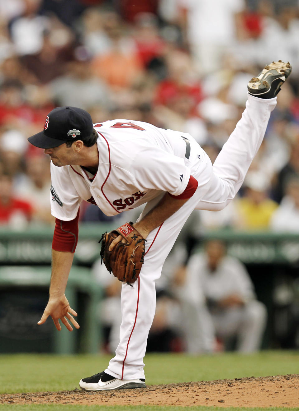 BOSTON, MA - JULY 7: Justin Germano #47 of the Boston Red Sox pitches during the ninth inning of game one of a doubleheader against the New York Yankees at Fenway Park on July 7, 2012 in Boston, Massachusetts. (Photo by Winslow Townson/Getty Images)