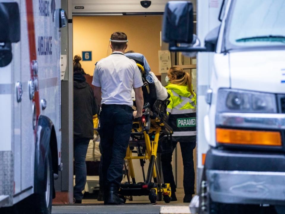 A paramedic is pictured at St. Paul’s Hospital in Vancouver, British Columbia on Monday, Jan. 10, 2022.  (Ben Nelms/CBC - image credit)