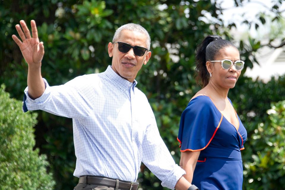 Friends in high places: Barack and Michelle have been embracing the VIP life (Getty Images)