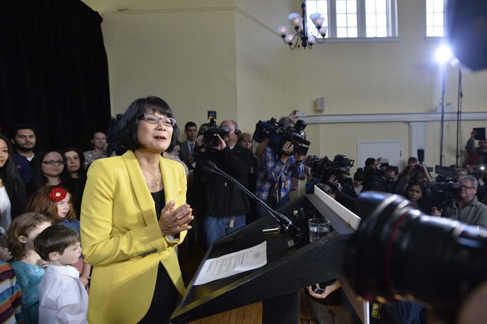 Olivia Chow speaks to the media after she officially entered into the race as a candidate for Mayor in the fall Toronto mayoral election in Toronto on Thursday, March 13, 2014. Chow says Toronto deserves better than Rob Ford, who "is no role model" for her granddaughters. She made no direct mention of the various scandals plaguing Ford — not his admissions that he smoked crack cocaine and bought illegal drugs while mayor nor his videotaped booze-fuelled rants. Instead, Chow hinted at Ford's issues with her "role model" comment, but called Ford's leadership "disappointing," saying he had failed to make critical investments and create jobs. A day after resigning as an NDP member of Parliament, Chow emphasized her humble beginnings and her family's hardworking immigrant story in her speech to a packed church in the inner city neighbourhood of St. James Town, where she grew up. (AP Photo/The Canadian Press, Nathan Denette)