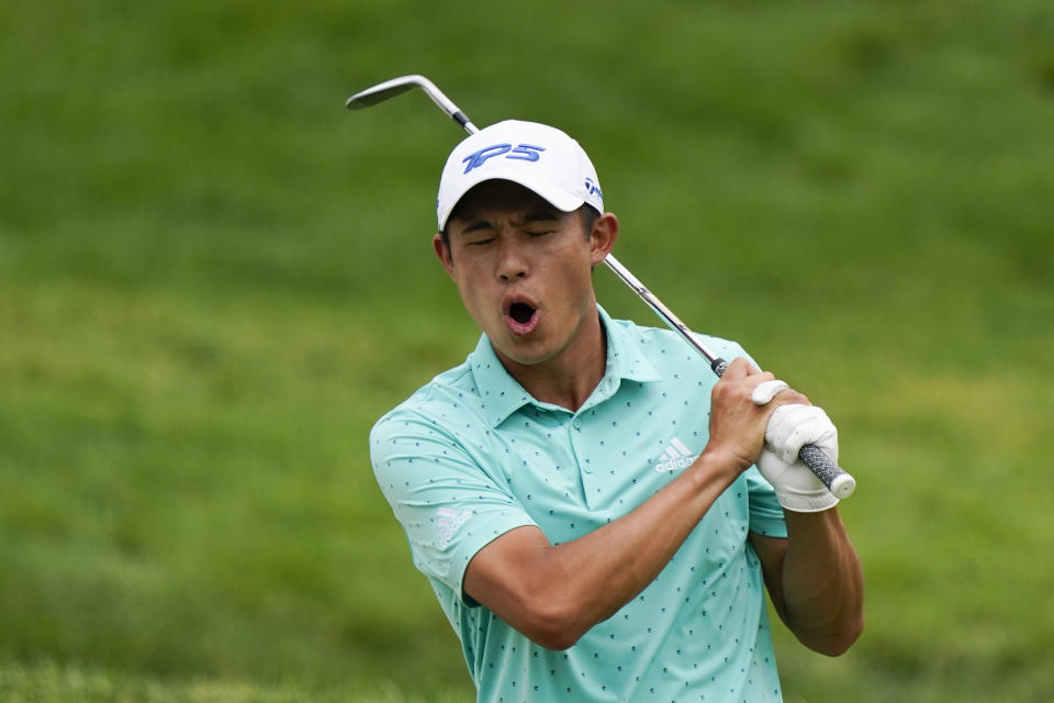 Collin Morikawa reacts to his chip shot to the fourth green during the final round of the Memorial golf tournament, Sunday, June 6, 2021, in Dublin, Ohio. (AP Photo/Darron Cummings)