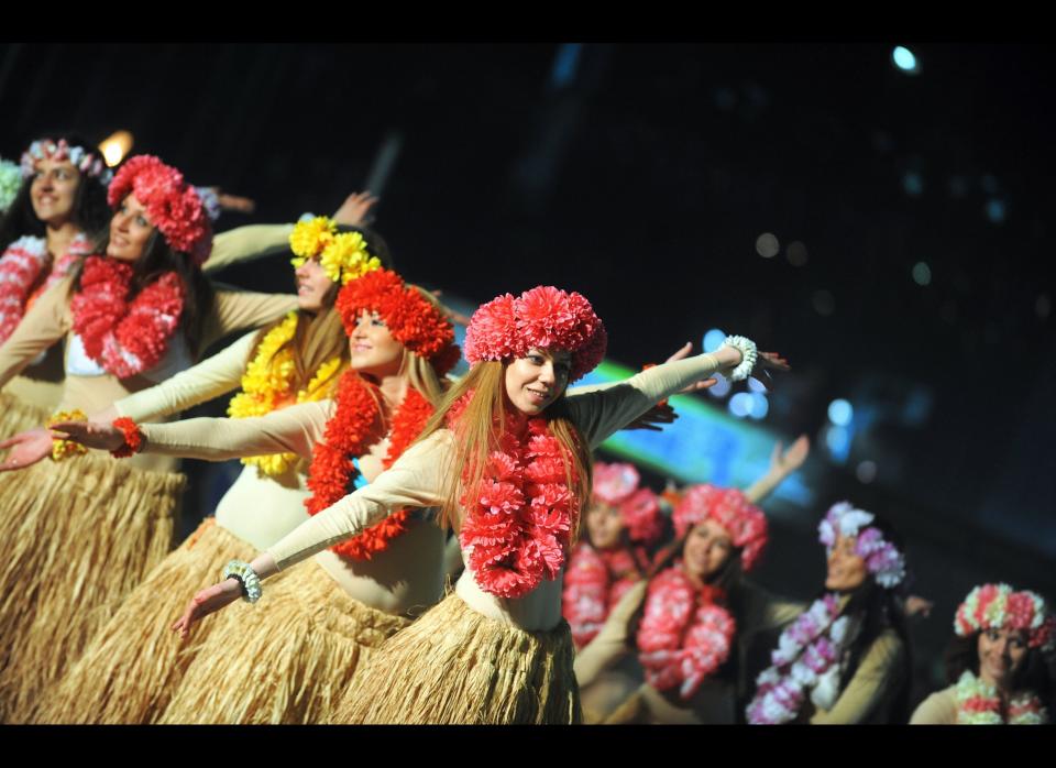 Carnival revellers dance as they parade in the streets of Strumica late on March 8, 2011.