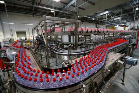FILE PHOTO: Bottles of Evian water are pictured in the new bottling plant during the official opening ceremony in Publier