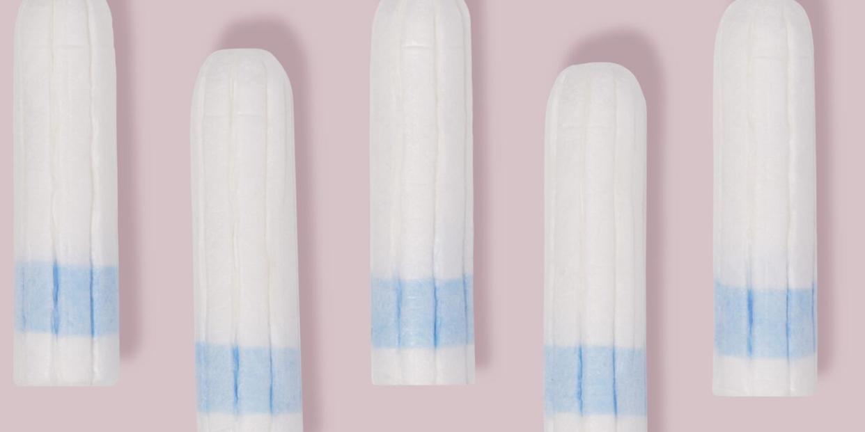 tampons on pink background - heavy metals in tampons study