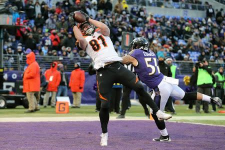 FILE PHOTO: Dec 31, 2017; Baltimore, MD, USA; Cincinnati Bengals tight end Tyler Kroft (81) catches a first quarter touchdown pass defended by Baltimore Ravens linebacker Kamalei Correa (51) at M&T Bank Stadium. Mandatory Credit: Mitch Stringer-USA TODAY Sports/File Photo