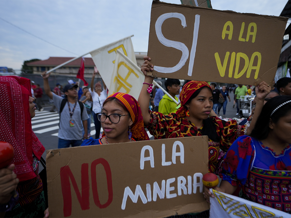  Gunas Indigenous women hold up signs tha read in Spanish “No to mining” and “Yes to life,” during a march outside the National Assembly to protest against a mining contract between First Quantum Minerals and Panama’s government over the Cobre Panama copper mine, in Panama City, Oct. 19, 2023.