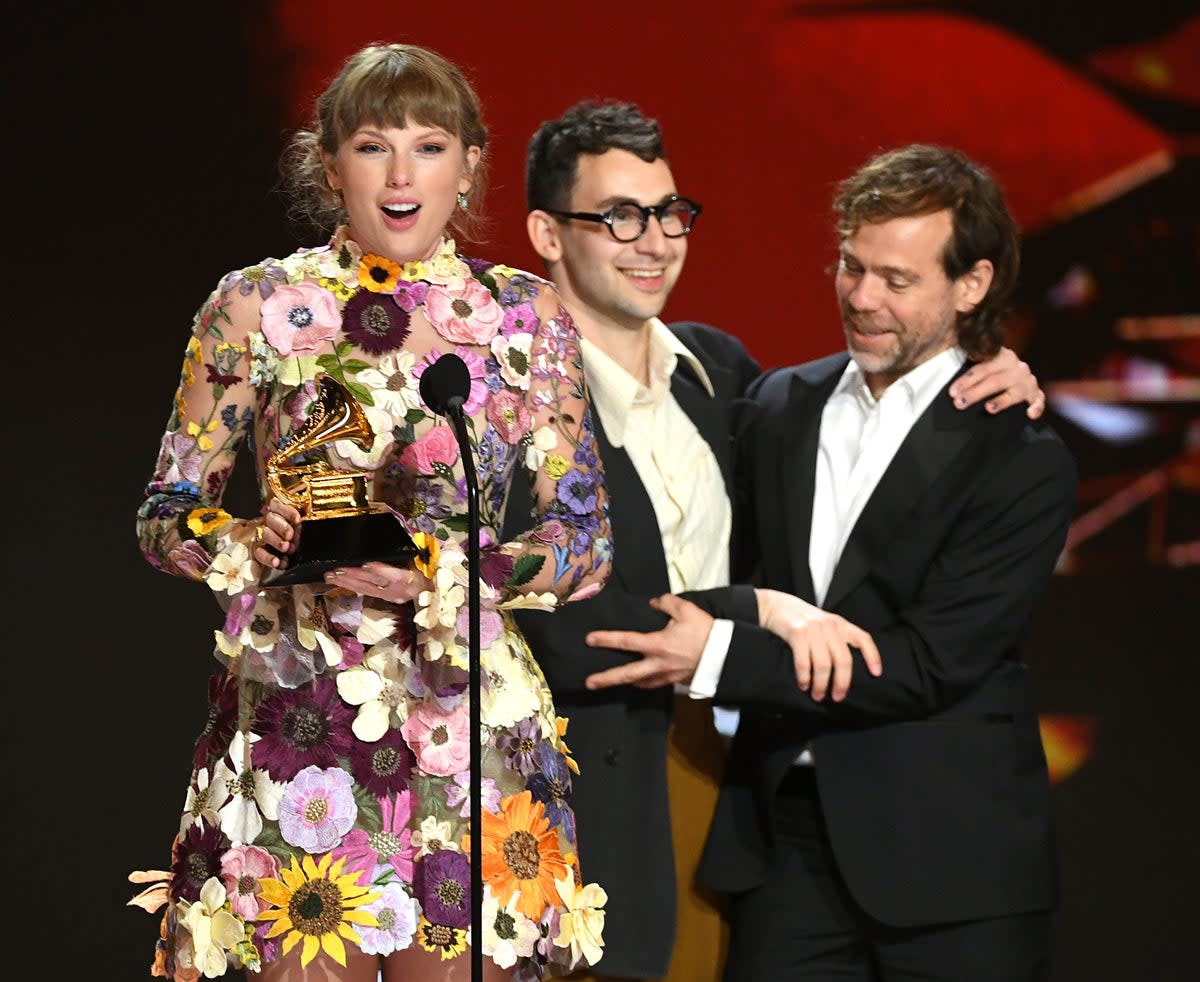 Taylor Swift, Jack Antonoff, and Aaron Dessner accept the Album of the Year award for Folklore onstage during the 63rd Annual GRAMMY Awards at Los Angeles Convention Center on March 14, 2021 (Getty Images for The Recording A)