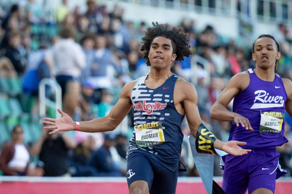 Lake Oswego’s James Bauman wins the boys 100 meters during the Oregon Relays April 19 at Hayward Field in Eugene.