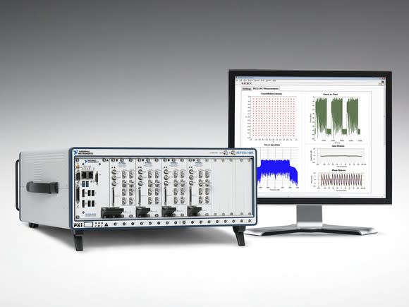 National Instruments test equipment next to a computer monitor