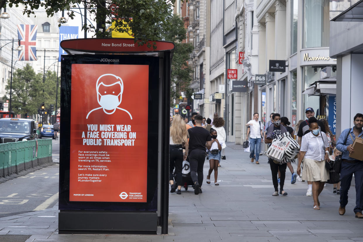 As Britain enters a period of deep recession, with some shops closing either temporarily or permanently as the economic downturn caused by the Covid-19 pandemic cuts hard, shoppers wearing face masks continue to come to the West End to Oxford Street on 13th August 2020 in London, United Kingdom. The Office for National Statistics / ONS has announced that gross domestic product / GDP, the widest gauge of economic health, fell by 20.4% in the second quarter of the year, compared with the previous quarter. This is the biggest decline since records began. The result is that Britain has officially entered recession, as the UK economy shrank more than any other major economy during the coronavirus outbreak. (photo by Mike Kemp/In PIctures via Getty Images)