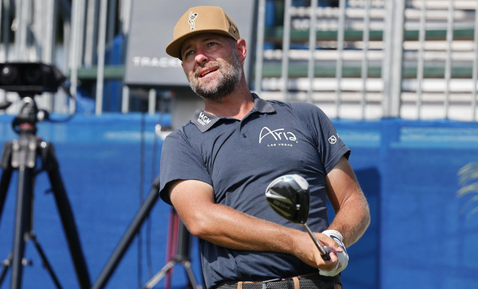 Ryan Moore hits his tee shot on the tenth hole during the second round of the Wyndham Championship golf tournament, Friday, Aug. 5, 2022, in Greensboro, NC. (AP Photo/Reinhold Matay)