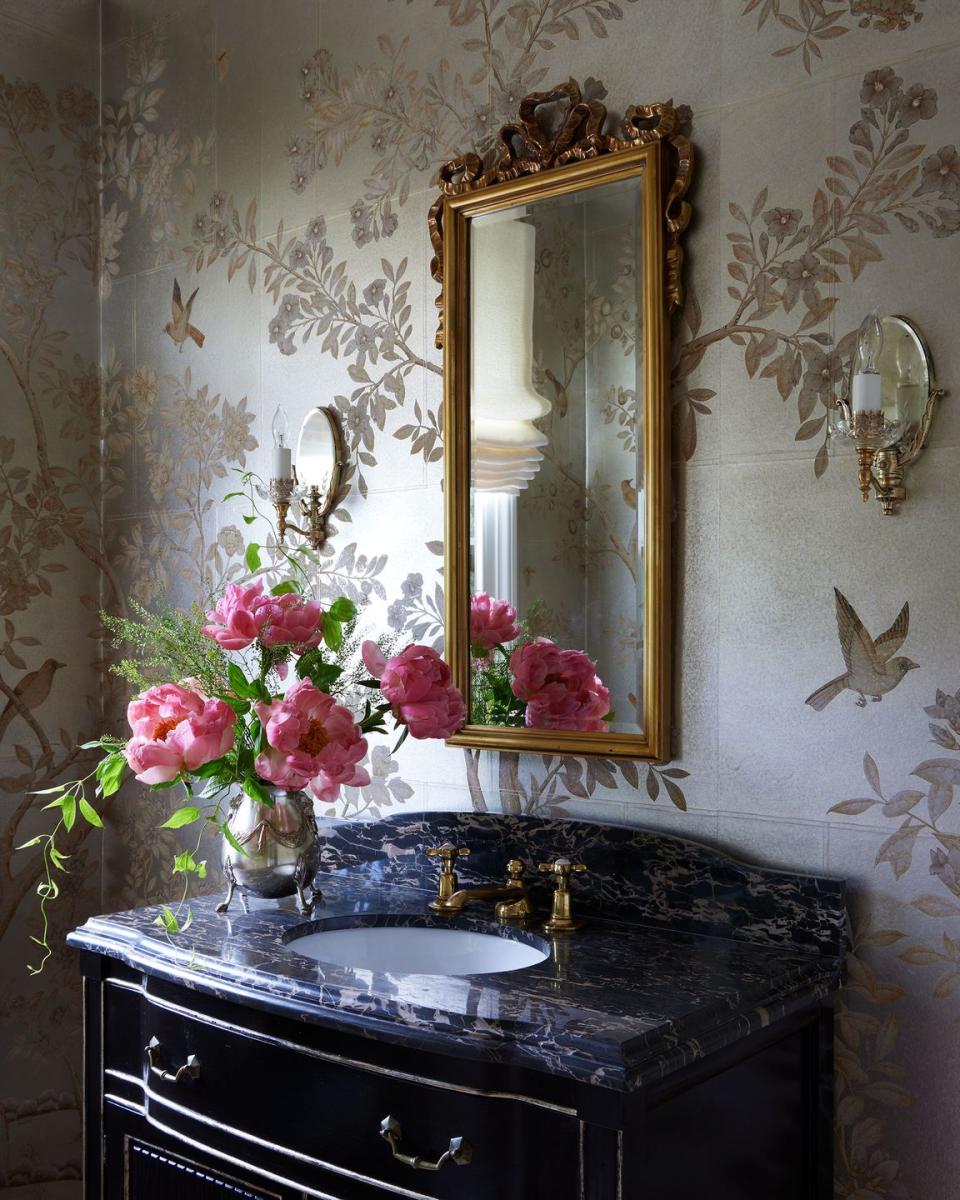 a bathroom with a large mirror