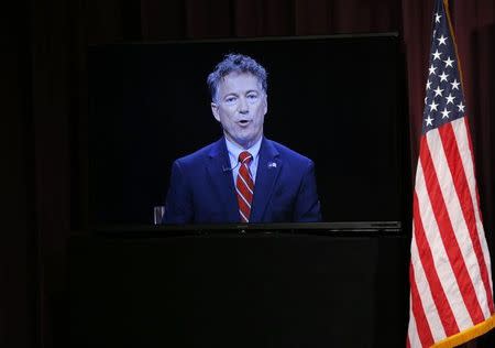 Republican U.S. presidential candidate and U.S. Senator Rand Paul participates remotely by video conference during the Voters First Presidential Forum in Manchester, New Hampshire August 3, 2015. REUTERS/Brian Snyder