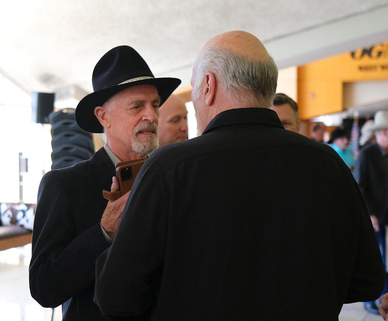 Keith Carradine, left, talks with Rex Linn after a panel discussion ahead of the Western Heritage Awards April 13, 2024, at the National Cowboy & Western Heritage Museum in Oklahoma City.