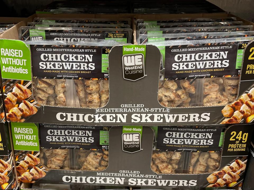 black and green stacked packages of chicken skewers at costco