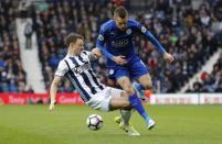 Britain Football Soccer - West Bromwich Albion v Leicester City - Premier League - The Hawthorns - 29/4/17 Leicester City's Jamie Vardy in action with West Bromwich Albion's Jonny Evans Reuters / Darren Staples Livepic