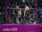 Canada's Derek Drouin jumps to a bronze medal in the men's high jump final at the Olympic Stadium during the Summer Olympics in London on Tuesday, August 7, 2012. THE CANADIAN PRESS/Sean Kilpatrick