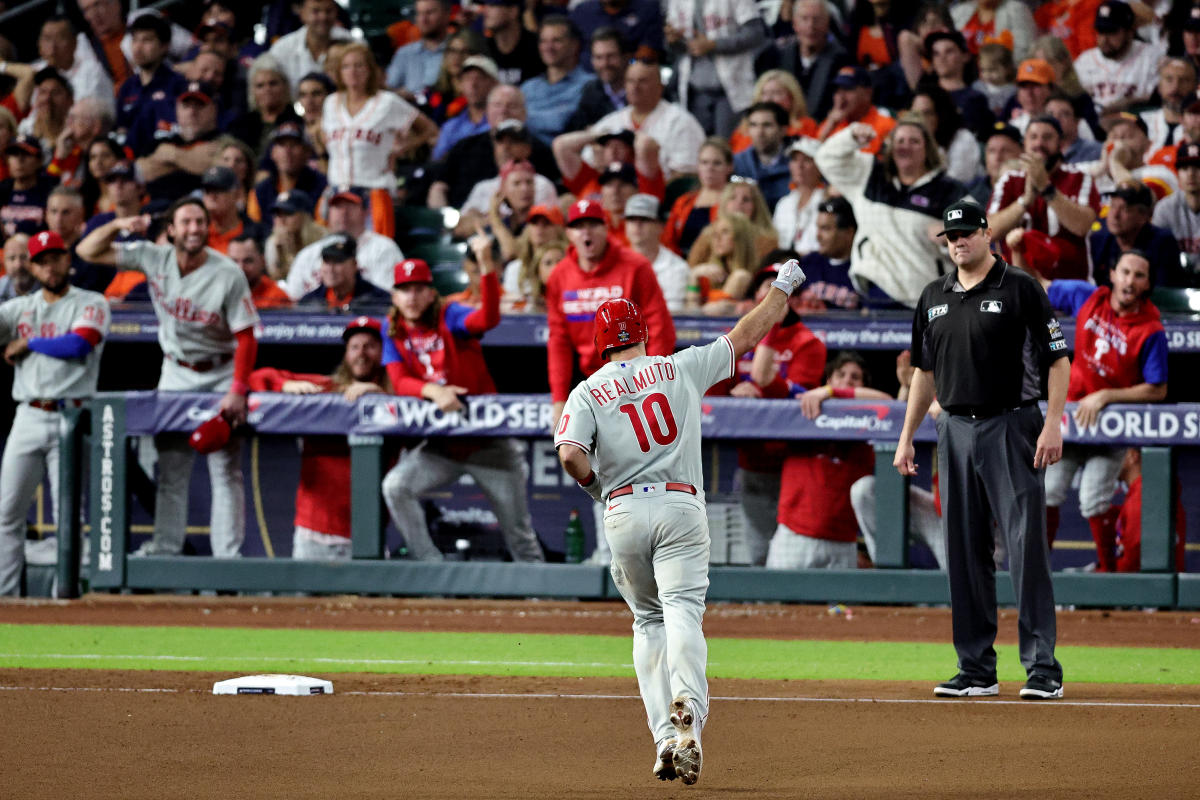 Astros fans greet Phillies fan decked out for World Series Game 1