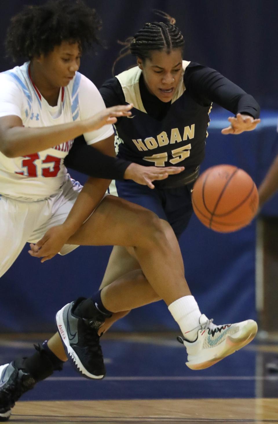 Archbishop Hoban senior Lanae Riley, photographed going for the ball against Villa Angela-St. Joseph's Amari Hancock earlier this season, led the undefeated Knights to a victory on Monday over Fremont Ross in the Classic in the Country at Berlin Hiland High School.