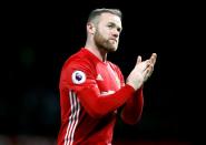 <p>In der WM-Vorrunde gegen Uruguay schoss Rooney 2014 sein erstes und bislang einziges Tor bei einer Fußball-Weltmeisterschaft. (Bild: AP)</p>