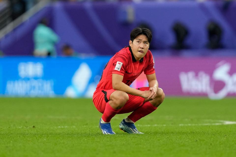 Dejected: South Korea were denied top spot in their Asian Cup group (AP)