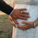 <p>Actress Julia Stiles might have announced her first pregnancy back in August but we can't get over how adorable her latest Instagram post is of her growing bump in a wedding dress.</p><p>Stiles married her fiancé Preston J. Cook over Labor Day weekend in a Pacific Northwest ceremony on a beach in Seattle with two friends present, and posted a snap from her big day with the caption: 'Who doesn't love a shotgun wedding?' with a smiling 'winky' face emoji.</p>