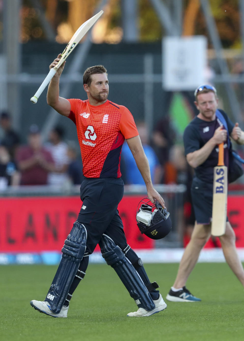 England's David Milan acknowledges the crowd after hitting 103 not out during the T20 cricket match between England and New Zealand in Napier, New Zealand, Friday, Nov. 8, 2019. (John Cowpland/Photosport via AP)