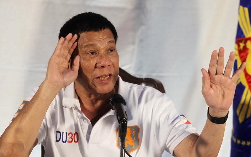 Philippine President Rodrigo Duterte speaks during a news conference in Davao city, southern Philippines August 21, 2016. Picture taken August 21, 2016.  REUTERS/Lean Daval Jr 