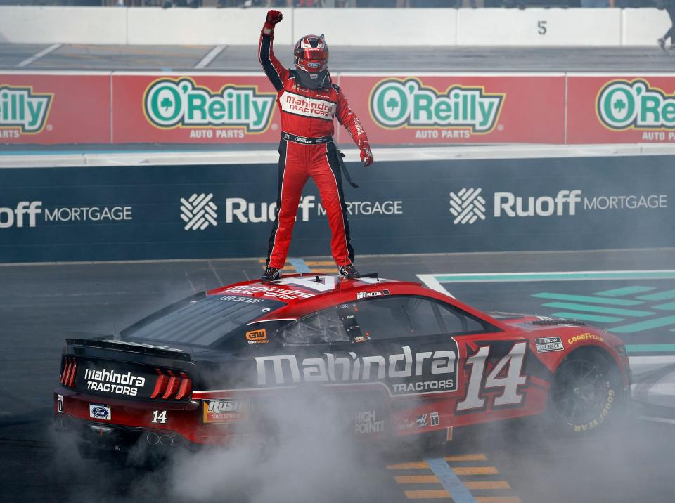 Chase Briscoe salutes the crowd from atop his car after winning the Ruoff Mortgage 500 on March 13 at Phoenix Raceway.