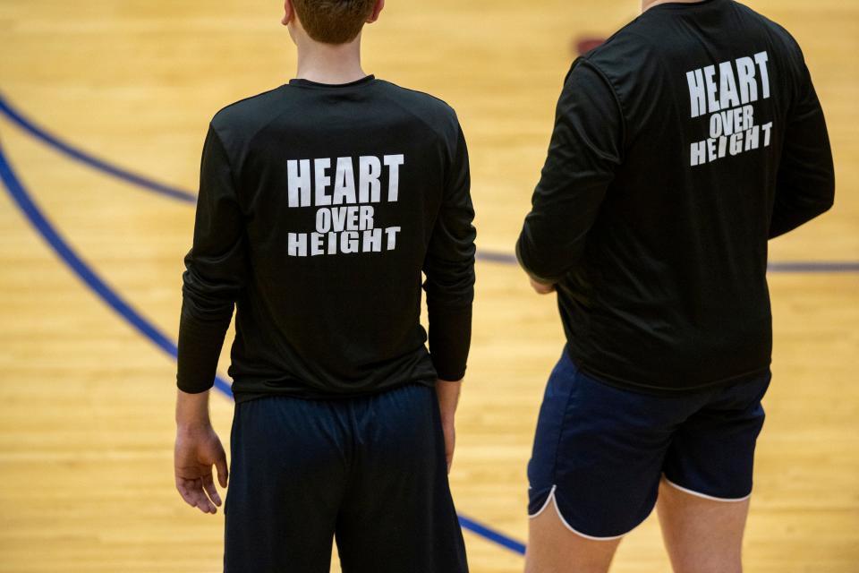 Perry Meridian High School players warmup on the court before a varsity volleyball match against Roncalli High School, Wednesday, May 4, 2022, at Perry Meridian High School.