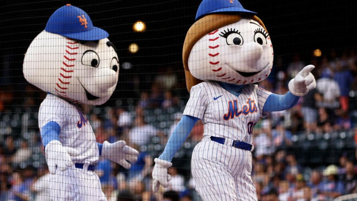 <div>NEW YORK, NEW YORK - AUGUST 12: Mr. and Mrs. Met perform during game two of a doubleheader against the Atlanta Braves at Citi Field on August 12, 2023 in New York City. (Photo by Rich Schultz/Getty Images)</div>